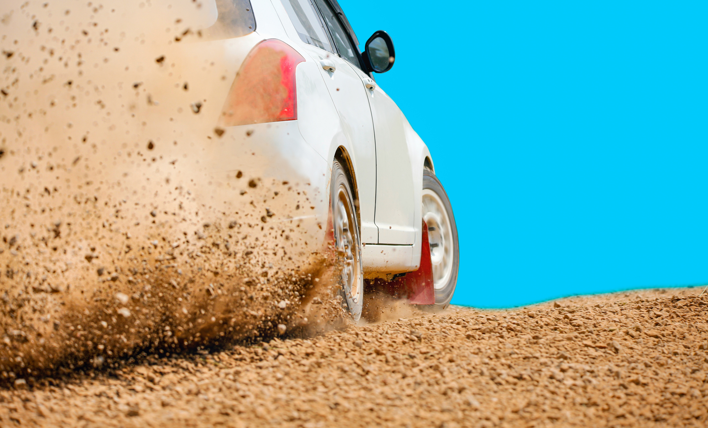 Rally Race Car Drifting on Dirt Track